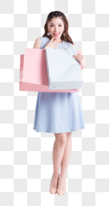 购物女性拿着购物袋做展示动作图片