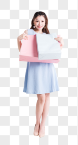 购物女性拿着购物袋做展示动作图片图片