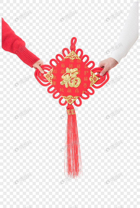 年轻夫妻拿着新年中国结图片