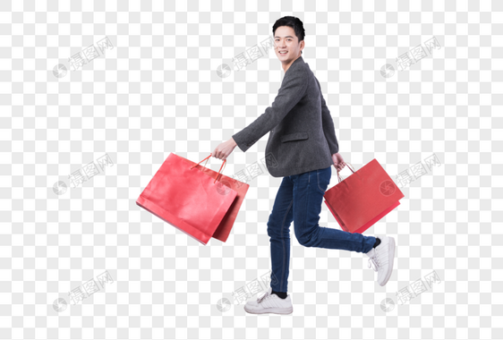 提着购物袋开心购物的年轻男子图片