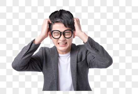 考试带着眼镜焦虑思考的年轻男性素材