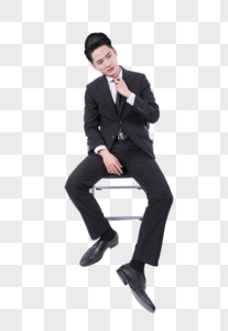 坐在椅子上沮丧的商务男士图片