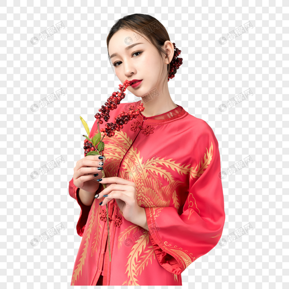 身着红装的美女手持梅花图片