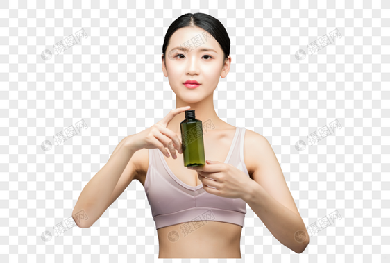 性感美女手持精华乳液瓶装图片