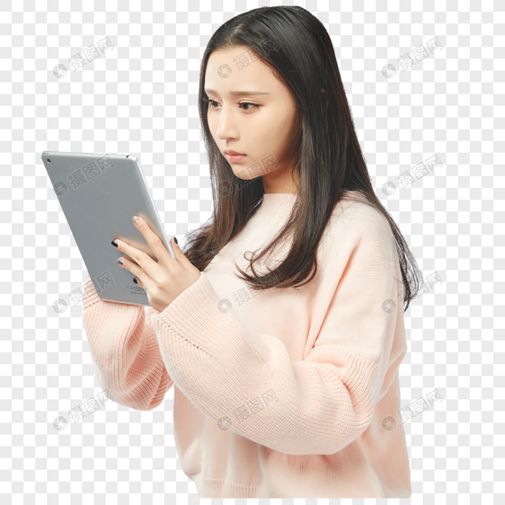 年轻女孩使用平板电脑动作图片