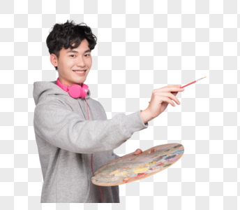 城市的艺术和科学蓝天拿着调色盘和画笔绘画的男生素材