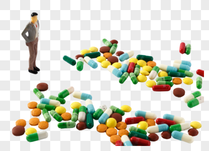 各种颜色彩色的药片和胶囊图片