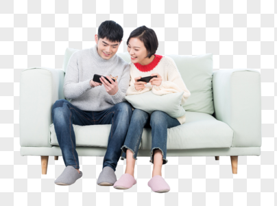 年轻情侣在客厅玩手机游戏图片