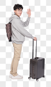 拉着行李箱打招呼的年轻人图片