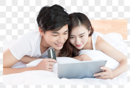 情侣在床上看电脑在线购物图片