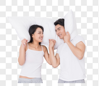 年轻夫妻枕着枕头图片