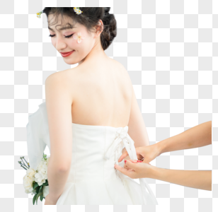 帮新娘调整婚纱礼服图片