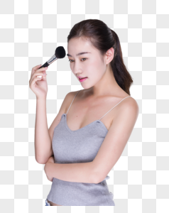 女子使用笔刷高清图片