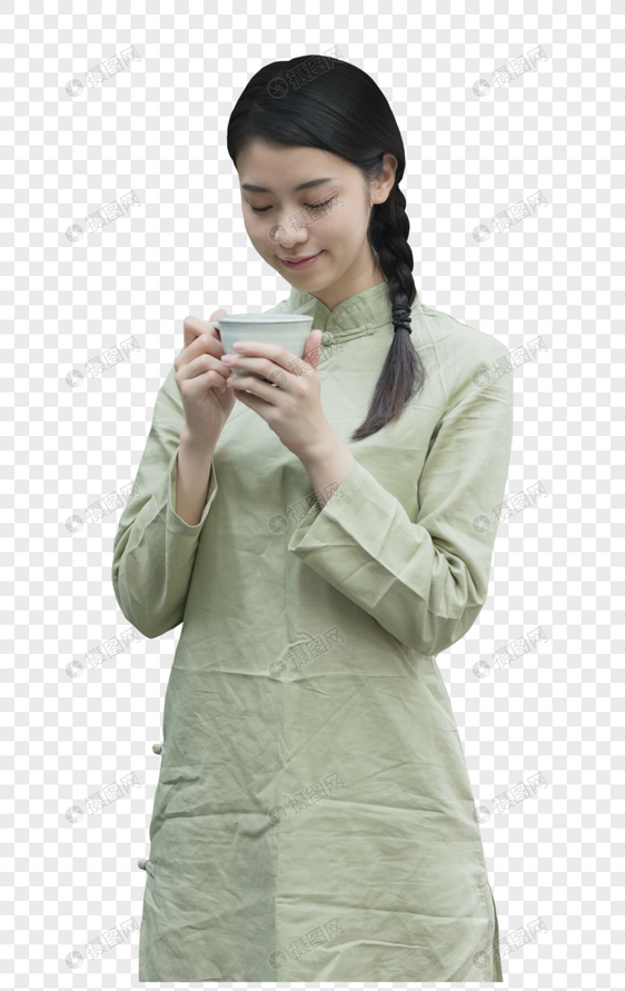 手捧茶杯的美女图片