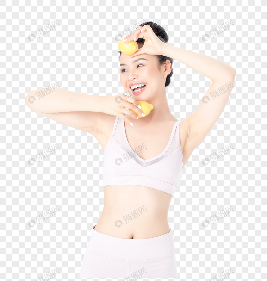 运动健身美女手拿柠檬健康图片