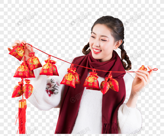 女性手拿新年装饰图片