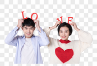 情人节手拿LOVE棚拍图片