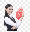 手拿红包的商务女性人像图片