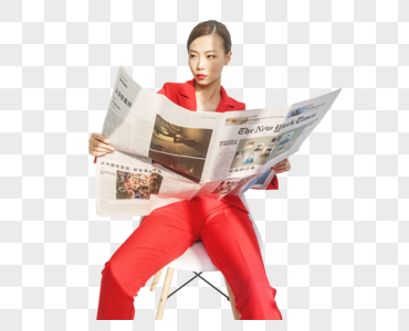 红西装女性看报纸高清图片