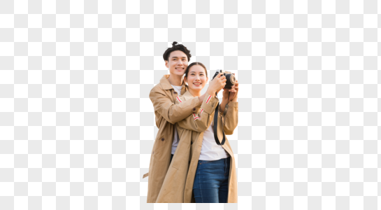 年轻情侣拿相机拍照高清图片