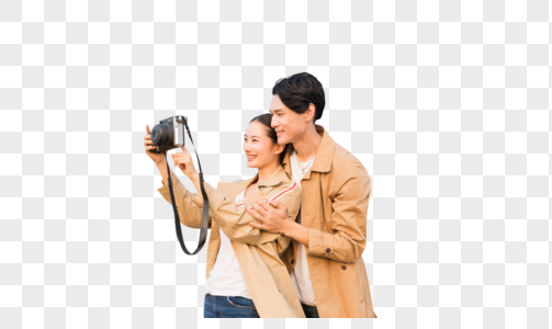 年轻情侣拿相机拍照图片