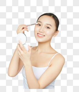 女性使用眼影刷图片