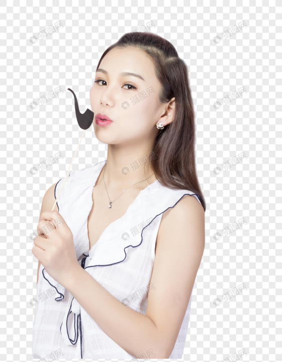 拿着可爱道具的青年女性图片