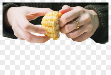 手拿玉米图片
