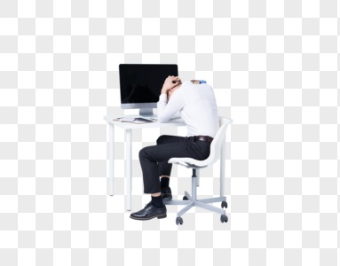 坐在办公桌前低头沮丧的商务白领图片