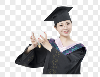 拿着灯泡的毕业女大学生图片