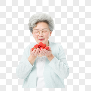 老人吃草莓老奶奶摘草莓高清图片