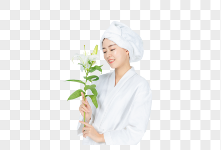 浴巾女性手拿百合花图片