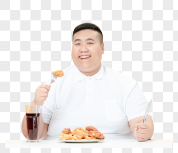 青年肥胖男性吃炸鸡可乐图片