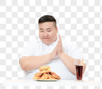 青年肥胖男性吃炸鸡可乐图片