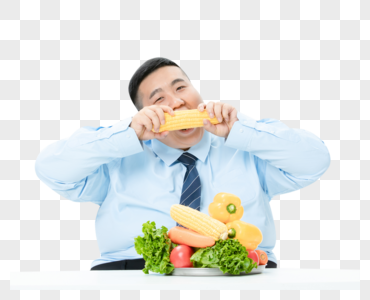 肥胖商务男性吃玉米图片