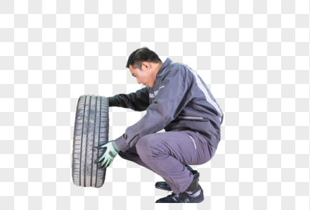 汽车维修人员安装轮胎图片