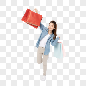 开心拎着购物袋的女大学生图片