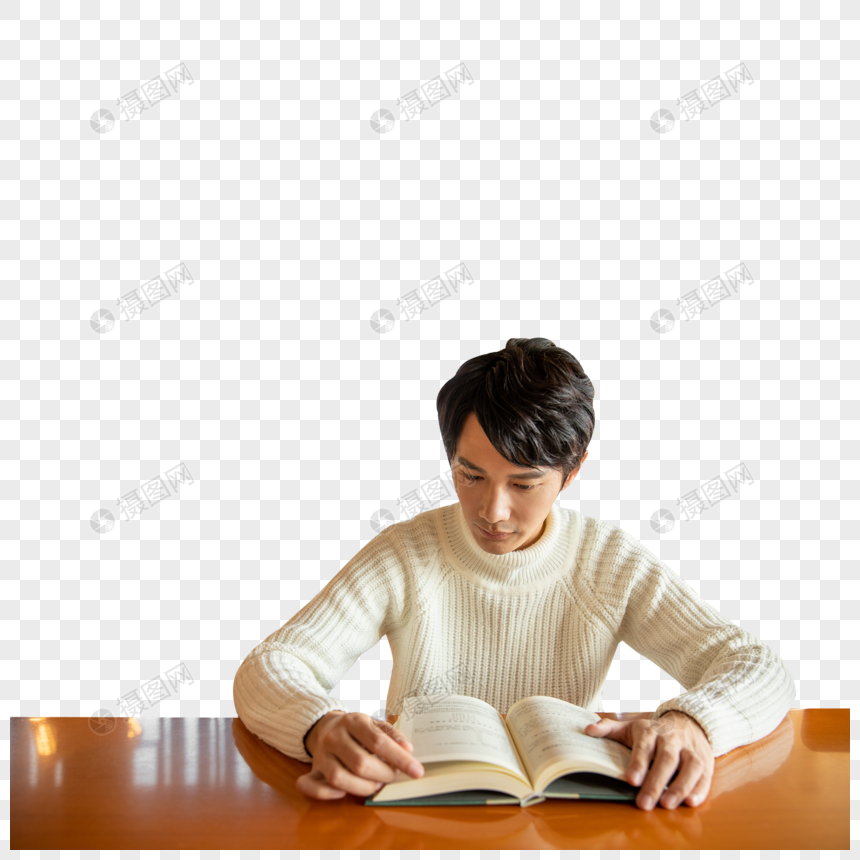 青年男性坐在图书馆阅读书籍图片