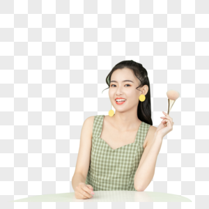 坐在化妆的甜美女孩图片