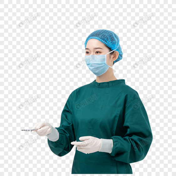 穿手术服拿医疗器械的医生图片