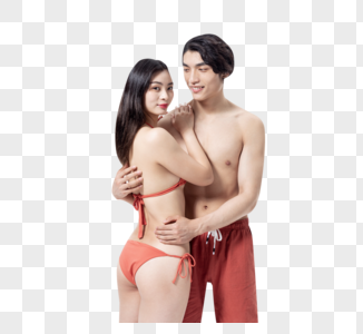 青年泳装情侣拥抱图片