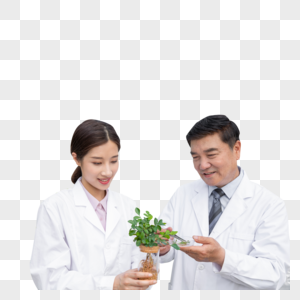 手捧植物幼苗的农业培育科学家图片