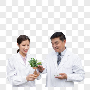 手捧植物幼苗的农业培育科学家图片