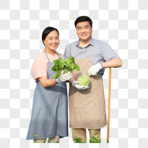 手捧蔬菜的农民夫妇图片
