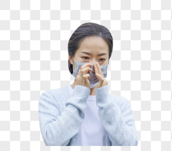预防跌到年轻女士户外戴口罩素材