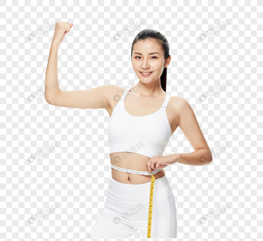 运动美女用皮尺测量腰围图片
