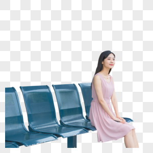 在公交车站台等待的青年女性图片
