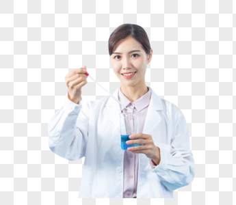 年轻女医疗科研人员使用滴管做实验图片