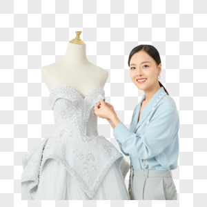服装设计师缝制婚纱高清图片