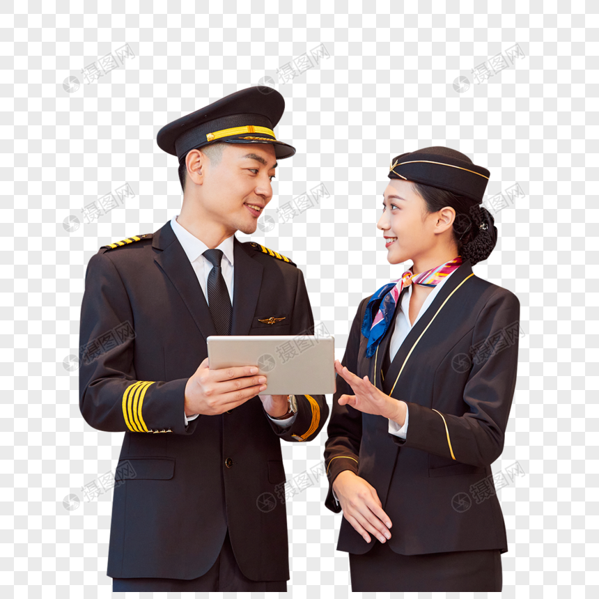 飞行员和空姐手持平板交谈图片